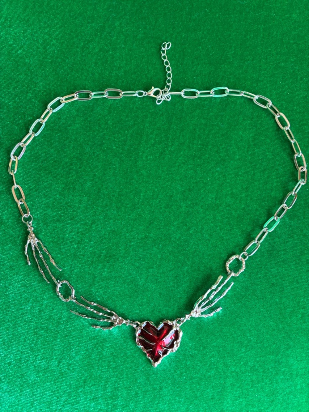 NEW Gothic skeleton hands holding a metallic red heart necklace dark romantic